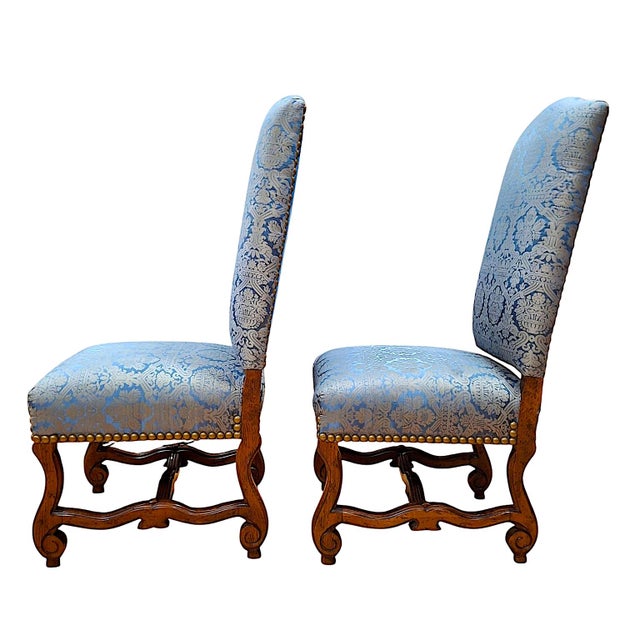 This elegant pair of upholstered Louis XIII-style, high-back side chairs showcases classic European aristocratic design,...