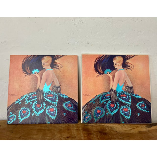 Beautiful pair of decorative tiles. This pair of pictures is titled "Madame Peacock" by the British artist Gilbert...