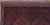 A hand-knotted and woven Baluch tribal runner. This geometric wool rug is rendered in a palette of red, burgundy, and...