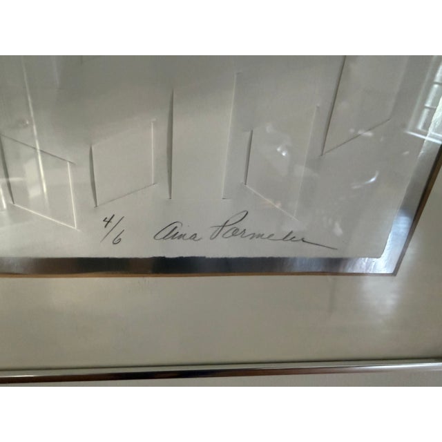 A signed, sculptural cast paper relief by American artist Aina Parmelee (1936–1990), numbered 4/6 — one of only six...