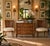 Elegant pair of Vintage French Louis XVI-style dining chairs featuring gracefully curved cane backs, carved floral...