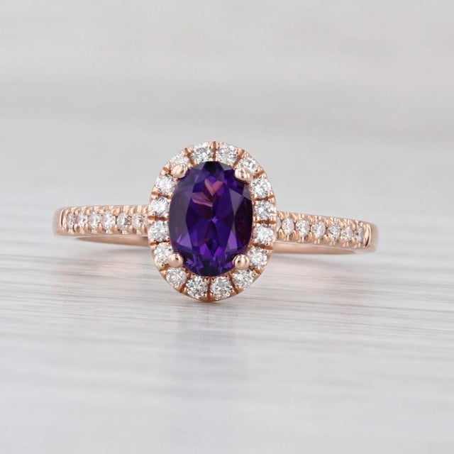 Gemstone Information: - Natural Amethyst - Carats - 0.70ct Cut - Oval Color - Purple - Natural Diamonds - Total Carats -...
