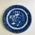 Antique blue willow ironstone 9” D plate” makers mark reads “ Staffordshire England “ small chip under the rim.