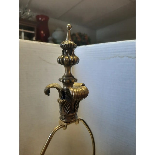 This is a stunning pair of rewired vintage Art Nouveau style solid brass lamps. The body of these lamps is made of blown...