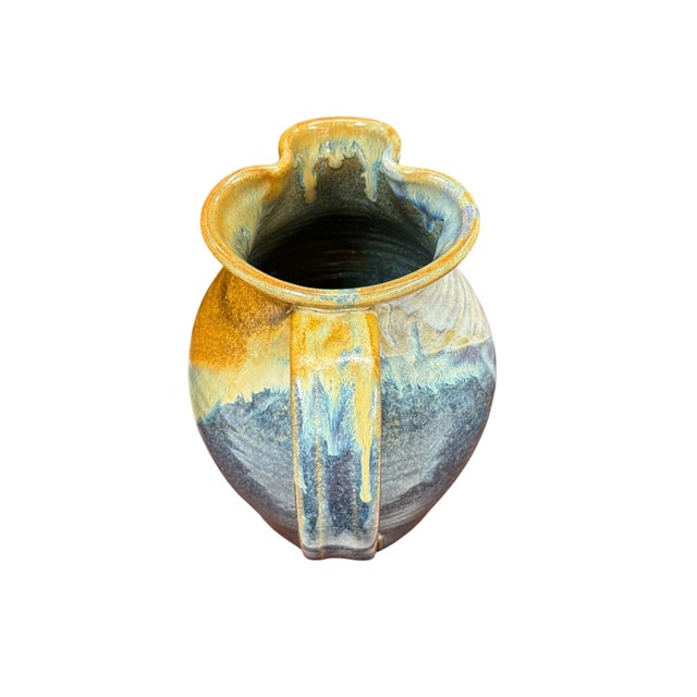 Beautiful handcrafted pottery pitcher by Mark Chrisco, showcasing the rich artistry and tradition of North Carolina studio...