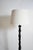Africanist ebonised wood floor lamp, 1970s. Height: 127 cm - 50.0 in Diameter: 30 cm - 11.81 in Height with lampshade: 171...