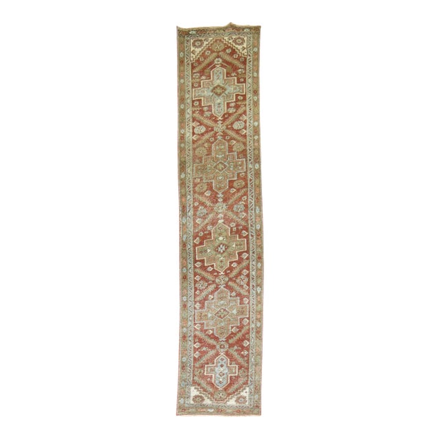Early 20th Century Narrow Tribal Rustic Heriz Runner - 2'4" x 10'8" For Sale