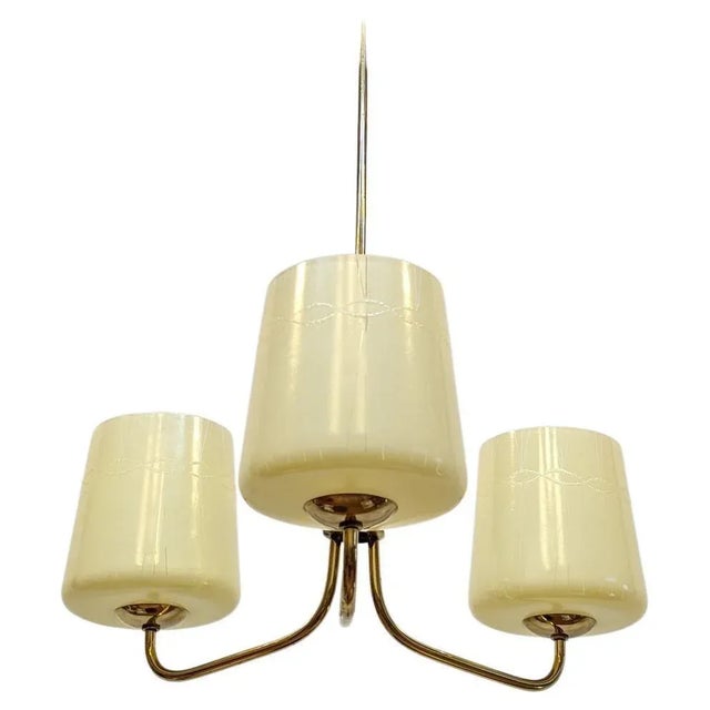 Austrian Mid Century Modern Brass and Opaline Glass Chandelier. Three arm modernist brass chandelier with slightly tapered...