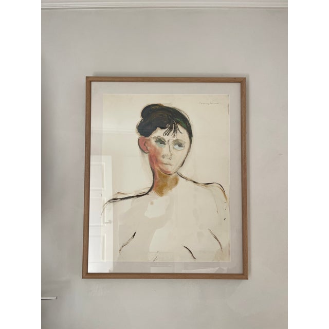 Beautiful portrait in watercolor, signed by artist in upper right. Beautiful light wood frame.