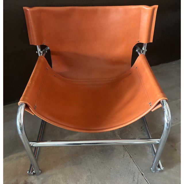 The Sling Chair was designed by Rodney Kinsman and manufactured by Bieffeplast Padova, Italy, and is in very good vintage...