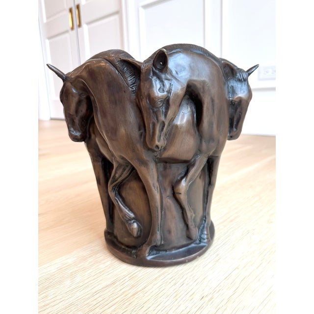 An exceptional vintage cast bronze vase sculpture featuring five beautifully modeled horses arranged in a circular...