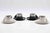 Set of 4 espresso cups with plates designed by Carlo Giannini in 1970s. Stainless steel (marked inox 18/10) for the cup...