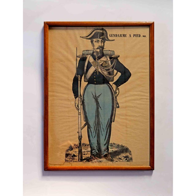 Pair of antique French hand colored soldier prints. Framed with glass. Titled 'Gendarme A Pied' and 'Chasseur De Afrique'....