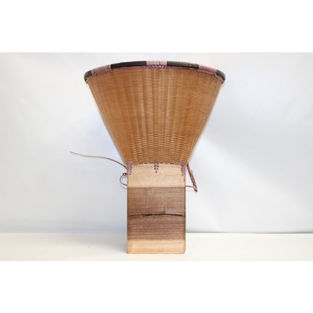 This Vintage Asian Harvest backpack is a remarkable piece of history, originally worn on the back during the harvest...