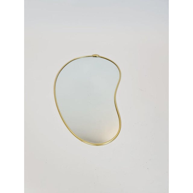Mid Century asymmetric German brass Original kidney wall mirror from the 60s model Rockabilly the mirror is in good...