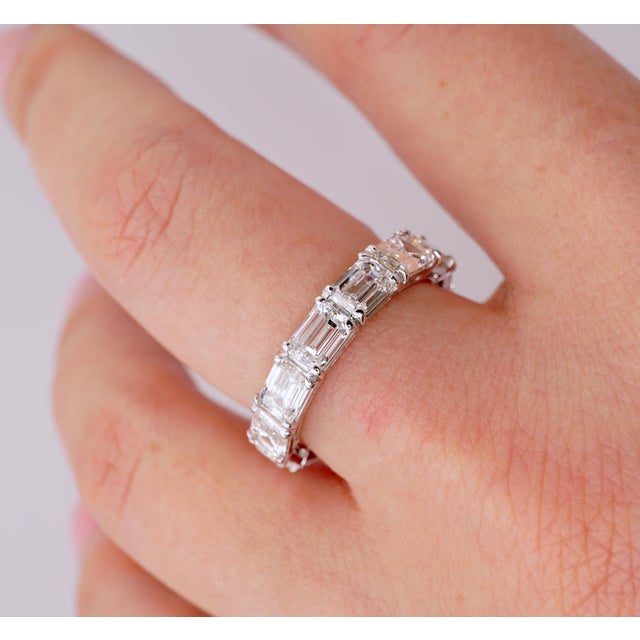 GIA certified East - West set Emerald cut diamonds are D-E-F color, VVS2-VS2 clarity. The total Carat weight = 5.01 ct....