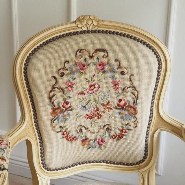 This French armchair is stylistically related to the Louis XV style and was created in the mid-20th century, inspired by...