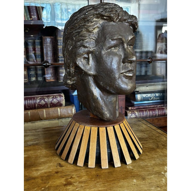 Old Bust Of A Young Man On Display Stand Sizes :- 42 cms tall, base at largest is 30 cms diameter.