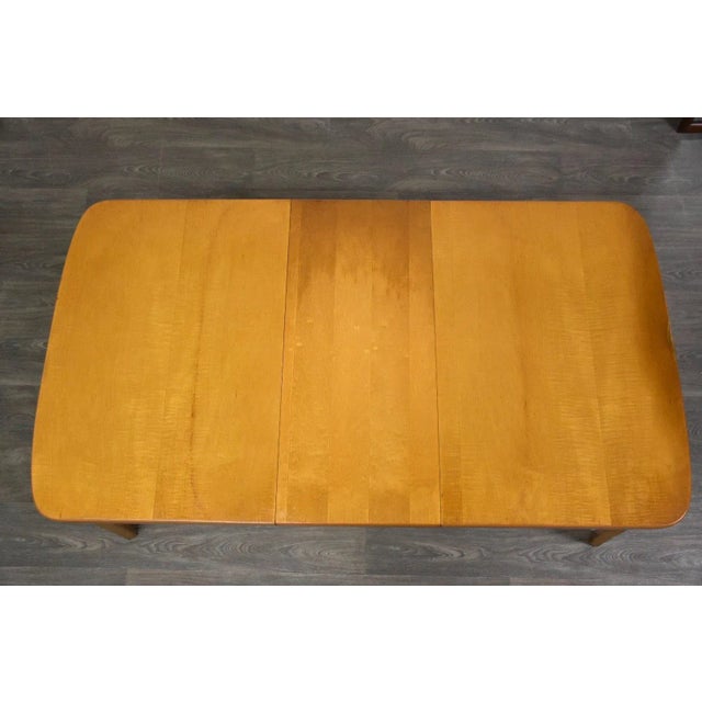 A mid century modern bent maple plywood dining table by Thaden Jordan with its original 1940’s finish. Comes with a 14”...