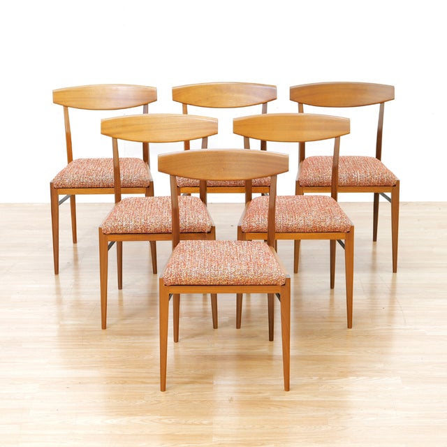 This stunning set of six dining chairs were was produced by A.H McIntosh of Kirkcaldy in Scotland during the 1960s....