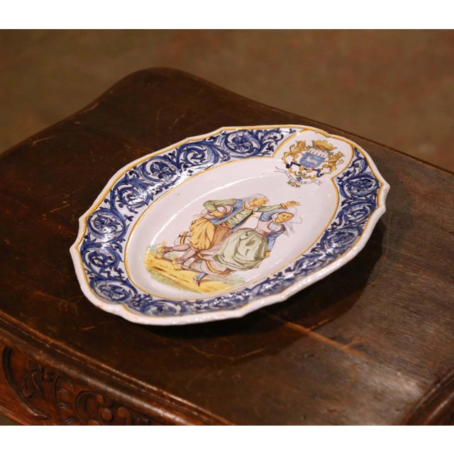 Bring a touch of Brittany’s rich folk tradition into your home with this charming antique Henriot Quimper faïence plaque,...