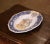 Bring a touch of Brittany’s rich folk tradition into your home with this charming antique Henriot Quimper faïence plaque,...