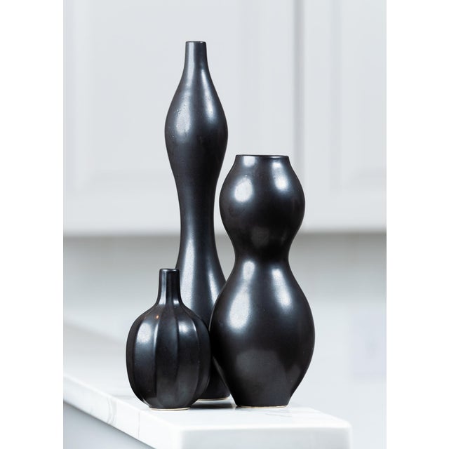 New York, New York 1990’s Stoneware vase, sensuous flowing form, minimal silhouette
