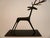 This whimsical sculpture of a stag is from the famed Werkstatte Hagenauer Wien.