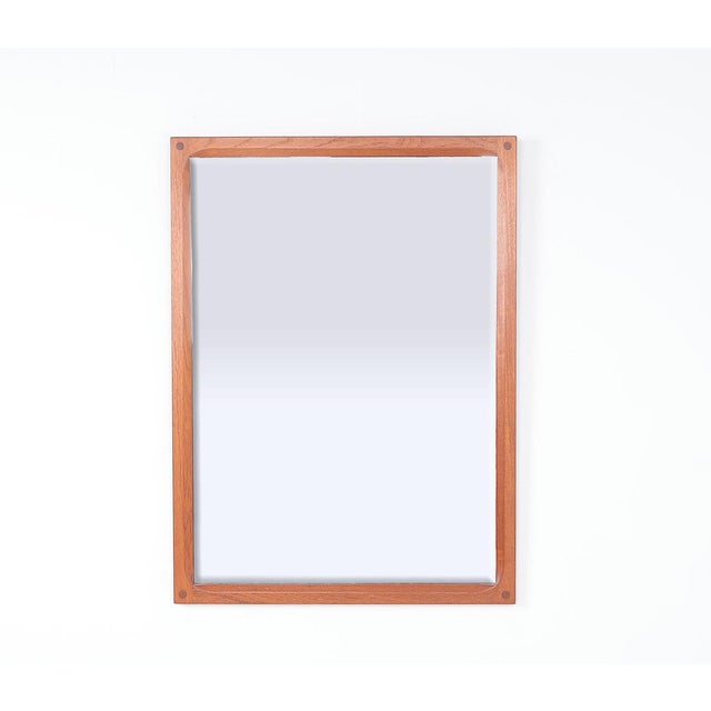 Vintage mirror with solid teak wood frame produced by aksel kjersgaard, denmark. designed by kai kristiansen in the 1960s,...