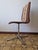 A refined swivel chair dating back to the 1970s, featuring an unmistakable Space Age/Mid-Century Modern design. The...