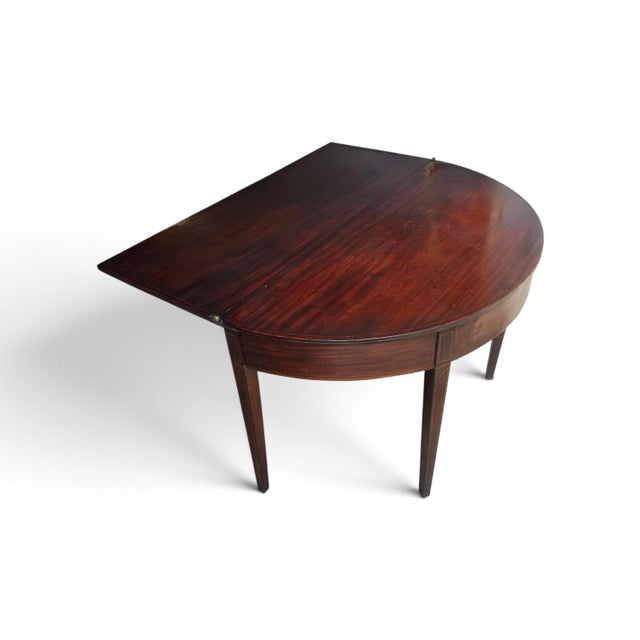 Exceptional English George III Hepplewhite Inlaid Mahogany Fold-Over Tea and Games Table, dating to circa 1790–1810. Of...