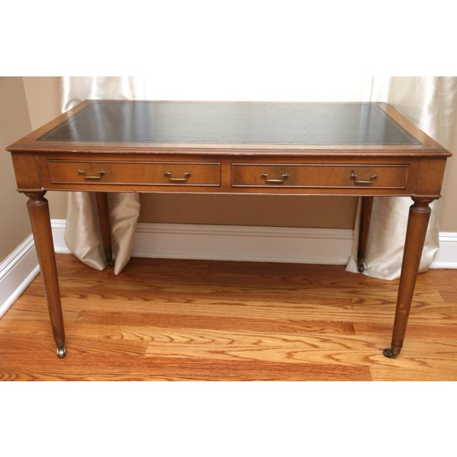 Leather Top Writing Desk 48 x 28 x 29 ht Beautiful wooden desk with leather top and motif with two drawers and wheels....