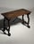 Italian console / side table. Early 19th century, ca. 1800. Crafted from solid hardwood with wrought iron elements on the...