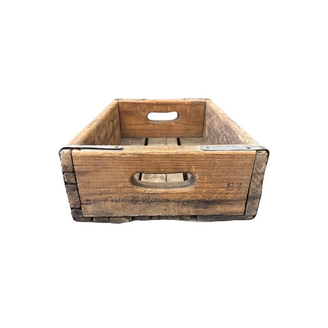 Step back in time with this authentic 1960 Coca-Cola wooden crate, a true piece of Americana history. Crafted from sturdy...