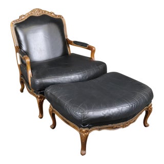 Fine Black Leather Carved French Louis XV Style Bergere Chair and Ottoman For Sale