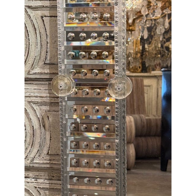 Elevate your space with the sleek elegance of the Modern Murano Etched Glass Mirror. The meticulous craftsmanship is...