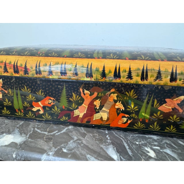 A hand-painted Kashmir India paper mache box, depicting a battle scene with horses and warriors, is a stunning piece of...