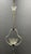 Refined 1950s pendant light attributed to barovier, crafted in murano glass and brass. The elegant composition features a...