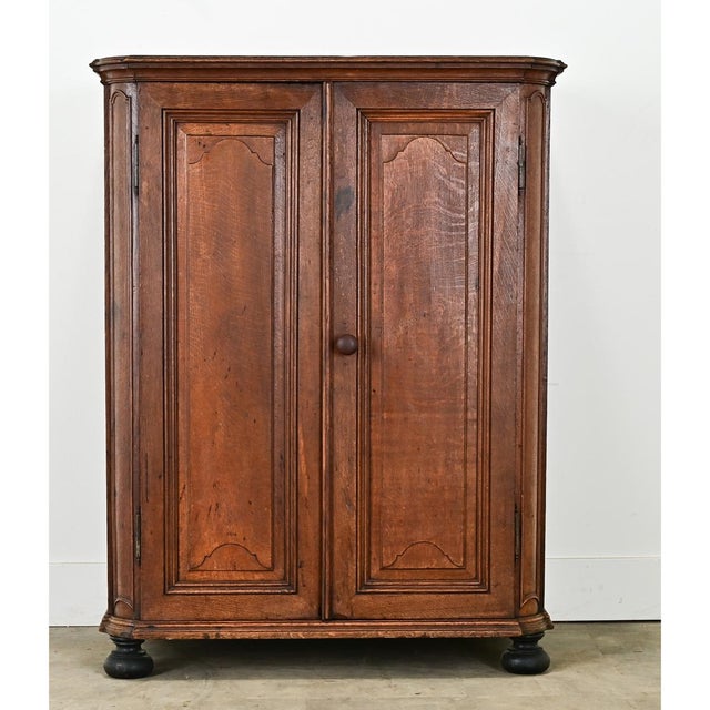 Dimensions: 48” H x 36 ½” W x 22” D A Belgian solid oak buffet from the 1700s, paneled on three sides with two doors and...