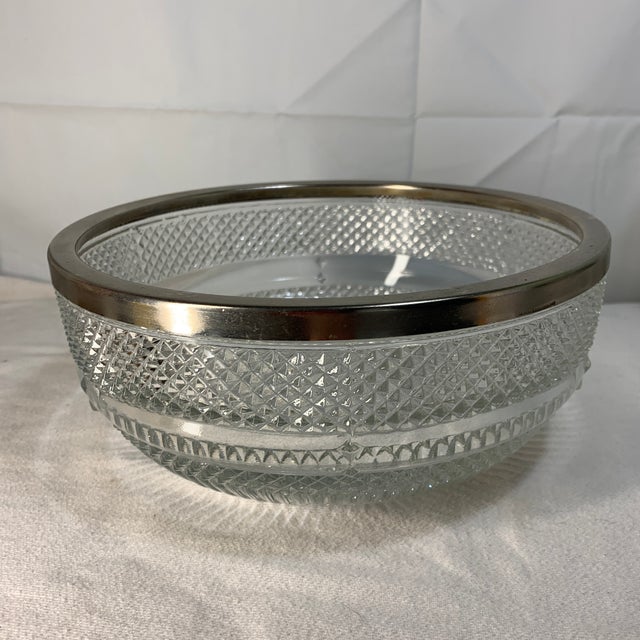 Add a touch of Mid-Century British elegance to your table with this beautiful vintage pressed glass serving bowl by...