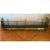 A classic English handwoven wirework fender with brass surrounds. The lower border is a wide brass moulding resting on...