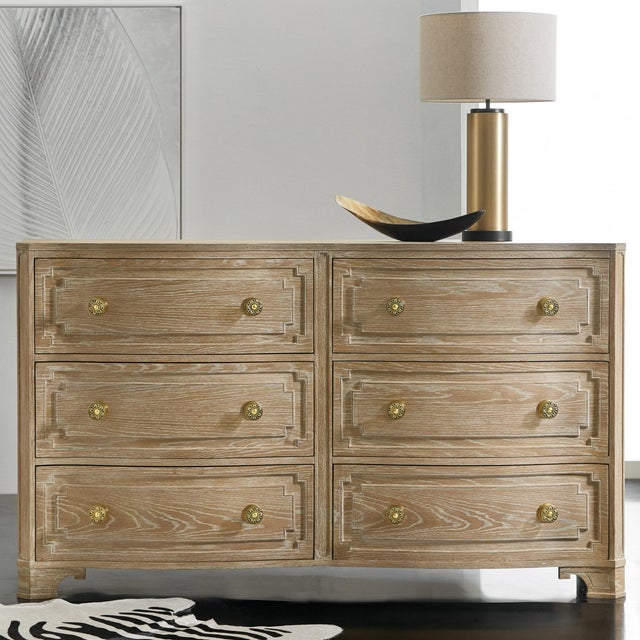 Honoring the craftsmanship and quality of the past, this gorgeous furniture piece is shure to become a modern-day...