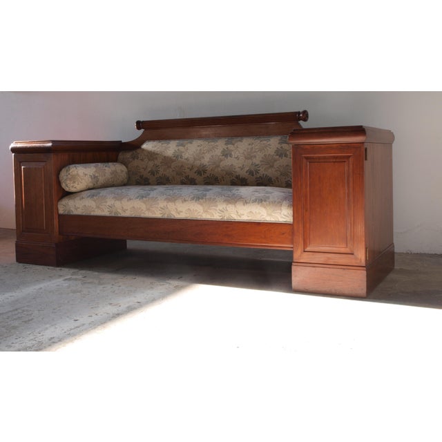 Absolutely stunning, this early 19th-century sofa hails from the Empire period, showcasing impeccable craftsmanship and...