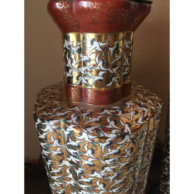 Most unique and extremely exquisite pair of porcelain table lamps. The porcelain bases are nicely shaped, hand painted...