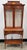 Good quality yew wood inlaid display cabinet on stand by Bradley. Coming in two main sections for ease of movement. Upper...