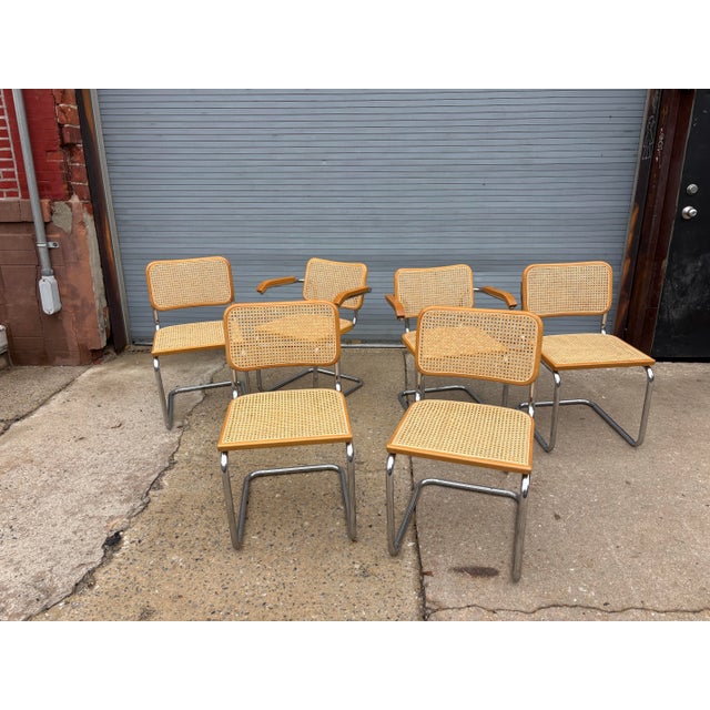 Set of 6 Cesca Tubular Chrome chairs with maple seat and backs and cane. This set was purchased in early 80's and had the...