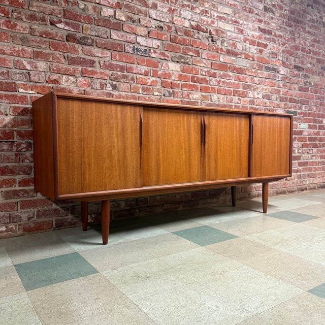 Authentic vintage mid-century Danish modern teak credenza designed by Axel Christiansen for ACO Møbelfabrik, Denmark,...