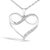 Experience the epitome of eternal affection with this exquisite .925 sterling silver pendant necklace, adorned with...