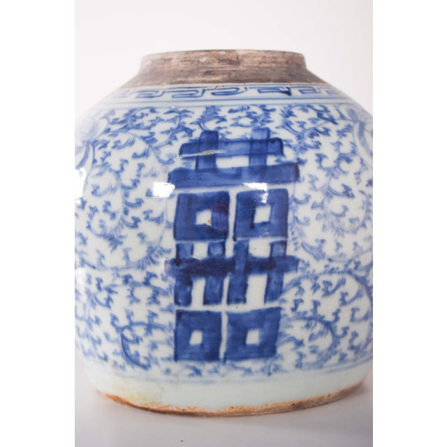 Lidless Chinese porcelain pot for exhortation. Blue and white decoration with the Shuangxi symbol, the ideogram for...