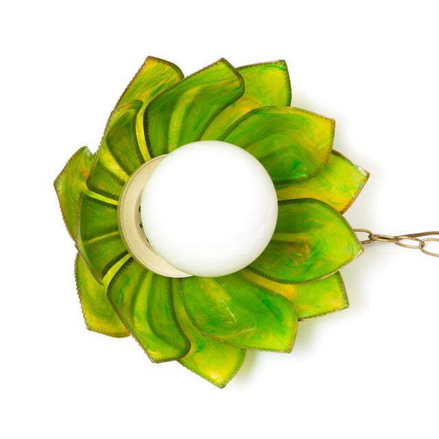 Vintage lotus / tulip style flower lamp with Lucite petals and gold beaded detail on the edges. Variations of swirled...